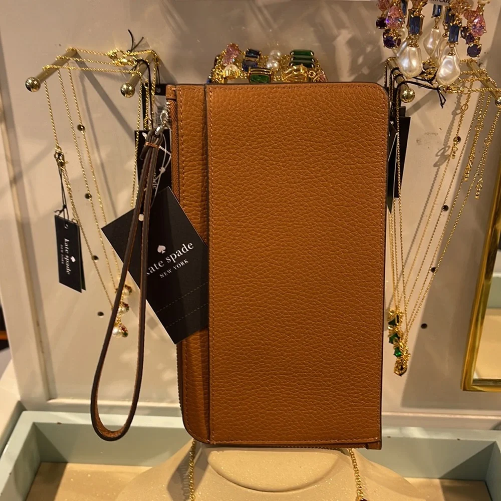 Kate Spade Medium Lucy L-Zip Wristlet Pebble Leather 

Warm Gingerbread 
NWT - Picture 16 of 16